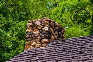 stone-chimney-on-cabin-300x198